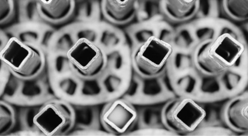 Close-up of square metal tubes bundled together.